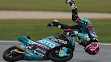 Joel Esteban of Spain crashes at Phillip Island Grand Prix Circuit.