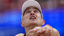 The Netherland's Steven van de Velde gets set to return a shot against Chile.