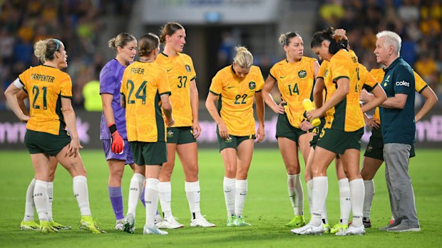 Tom Sermanni, Interim Head Coach of Australia talks to his players.