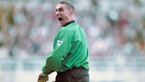 Wimbledon's stand in goalkeeper Vinny Jones shares a joke with Newcastle fans.