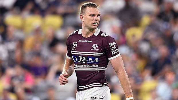 Tom Trbojevic of the Sea Eagles looks on.