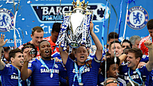 Captain John Terry of Chelsea lifts the trophy.