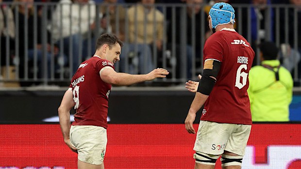 Tomos Williams of the British & Irish Lions holds his left leg after his second try.