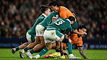 Joseph-Aukuso Suaalii of Australia is tackled by Ireland.
