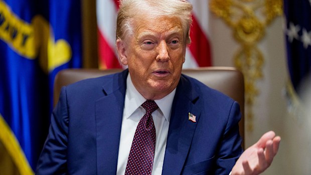 US President Donald Trump during a cabinet meeting at the White House in Washington, DC, US, on Tuesday, Aug. 26, 2025. Trump said he was prepared for a legal fight with Federal Reserve Governor Lisa Cook after he moved to oust her from her post following allegations that she falsified mortgage documents. Photographer: Aaron Schwartz/CNP/Bloomberg