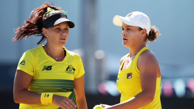 Ashleigh Barty (r) and Casey Dellacqua (l) play in the doubles match at the Fed Cup in 2018.
