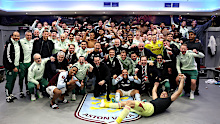 Aston Villa celebrate in the dressing room after the team's victory.