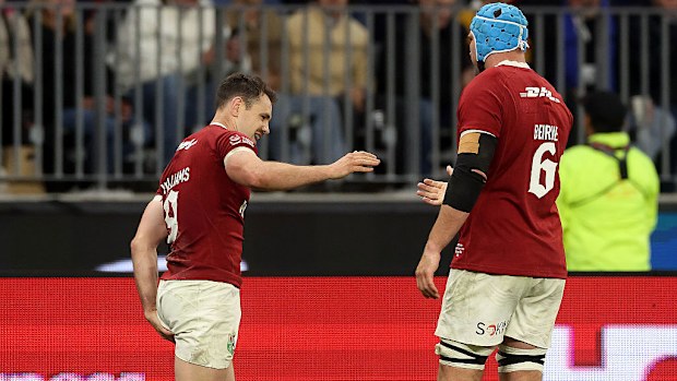 Tomos Williams of the British & Irish Lions holds his left leg after his second try.