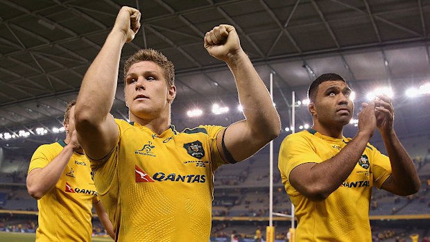 Michael Hooper and Wycliff Palu of the Wallabies thank fans in 2013 in Melbourne.
