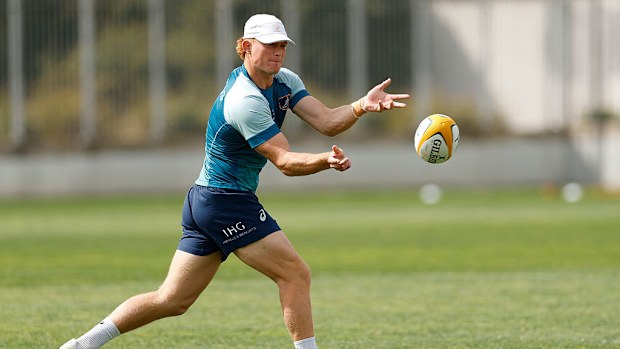 Tane Edmed takes part during a Wallabies training session.