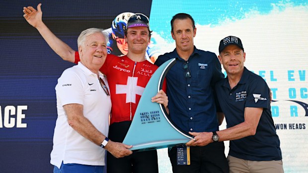 Cadel Evans poses at podium during the 9th Cadel Evans Great Ocean Road Race 2025.