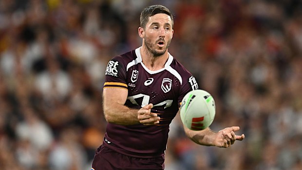 Ben Hunt of the Broncos passes the ball.