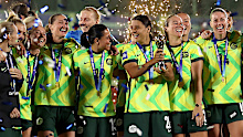 NAIROBI, KENYA - APRIL 15: Sam Kerr of Australia lifts the trophy following the FIFA Series 2026 Final between Kenya and Australia at Nyayo National Stadium on April 15, 2026 in Nairobi, Kenya.  (Photo by Hassan Omar Wamwayi - FIFA/FIFA via Getty Images)