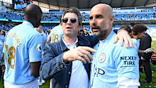 Noel Gallagher speaks to Pep Guardiola.