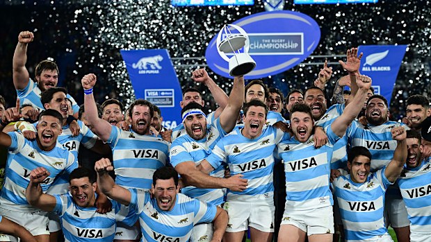 Argentina celebrate after winning.