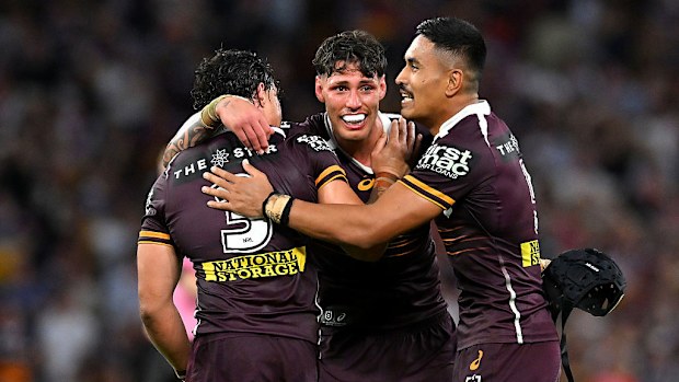 Kotoni Staggs, Jordan Riki and Deine Mariner celebrate a try.
