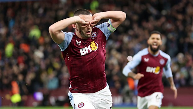 John McGinn of Aston Villa celebrates scoring against Arsenal.