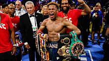 Devin Haney celebrates after defeating Vasiliy Lomachenko.