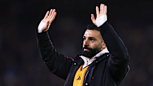 Mohamed Salah of Liverpool waves to the fans.