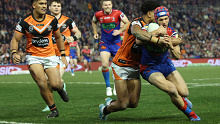 NEWCASTLE, AUSTRALIA - JULY 14:Kalyn Ponga of the Knights scores a try during the round 20 NRL match between Newcastle Knights and Wests Tigers at McDonald Jones Stadium on July 14, 2023 in Newcastle, Australia. (Photo by Scott Gardiner/Getty Images)