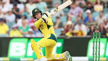 Jake Fraser-McGurk swings the bat during Australia's third ODI against the West Indies. 