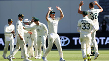 PERTH, AUSTRALIA - DECEMBER 17: Josh Hazlewood of Australia celebrates with Mitchell Marsh of Australia and team mates after taking the final wicket of Khurram Shahzad of Pakistan and winning the test by 360 runs during day four of the Men's First Test match between Australia and Pakistan at Optus Stadium on December 17, 2023 in Perth, Australia (Photo by Paul Kane/Getty Images)