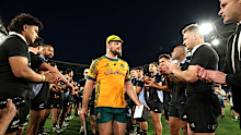 James Slipper of the Wallabies walks through a guard of honour.