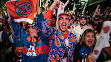 New York Knicks fans cheer during the first quarter.