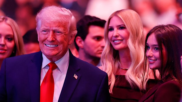 President Donald Trump poses for a photo with his daughter, Ivanka Trump, during UFC 327.
