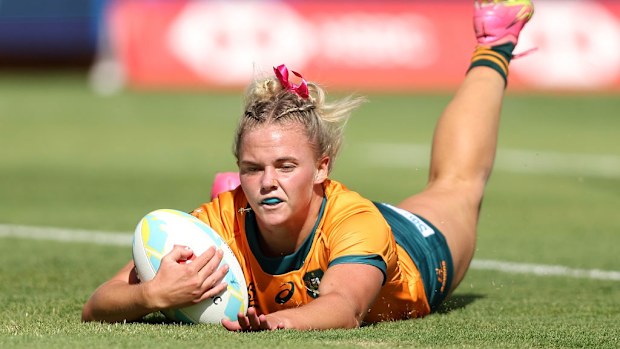 Heidi Dennis of Australia crosses for a try.