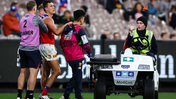 Hugh McCluggage is seen injured against Hawthorn.