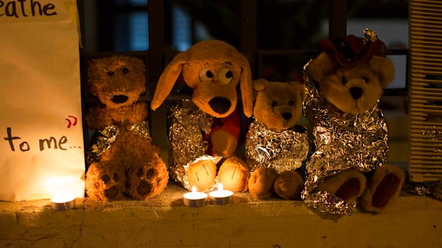 Stuffed toy animals wrapped in aluminum foil representing migrant children separated from their families are displayed in protest in front of the United States embassy in Guatemala City.