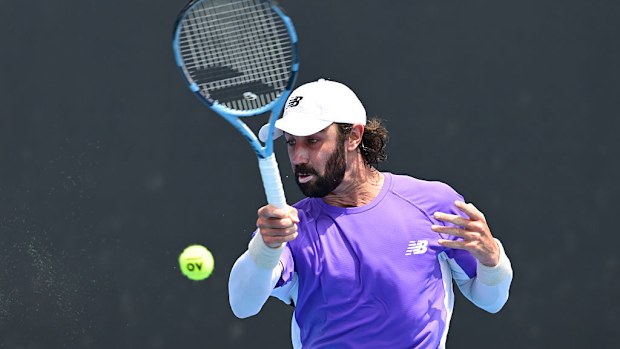 Jordan Thompson of Australia plays a forehand against Juan Manuel Cerundolo of Argentina.