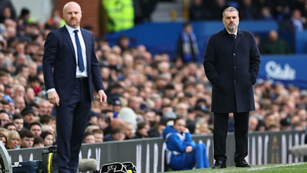 Sean Dyche of Everton and Ange Postecoglou of Tottenham Hotspur look on.