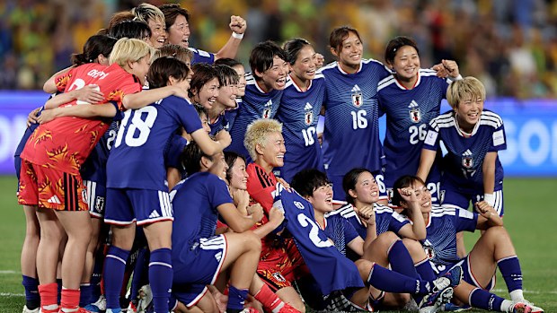 Japan pose for a team photo after winning the AFC Women's Asian Cup.