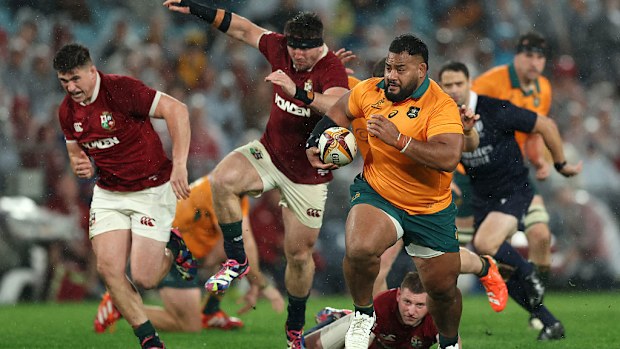 Taniela Tupou of the Wallabies makes a break.