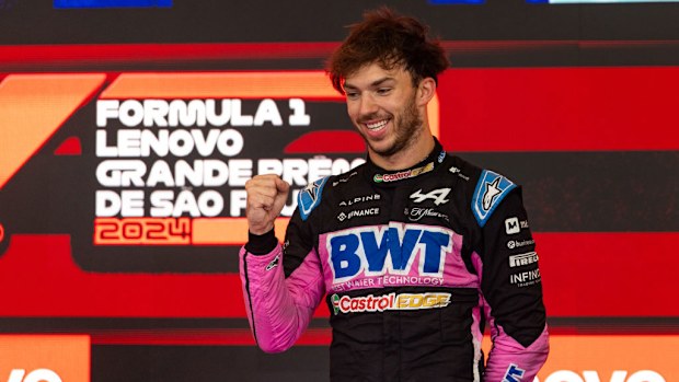 Pierre Gasly of France and Alpine F1 team on the podium at the F1 Grand Prix of Brazil in 2024.