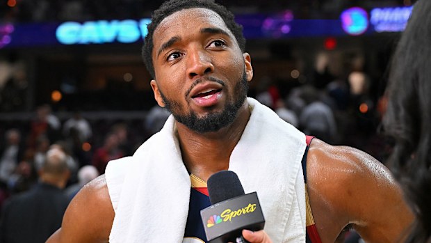 Donovan Mitchell of the Cleveland Cavaliers talks with the media.