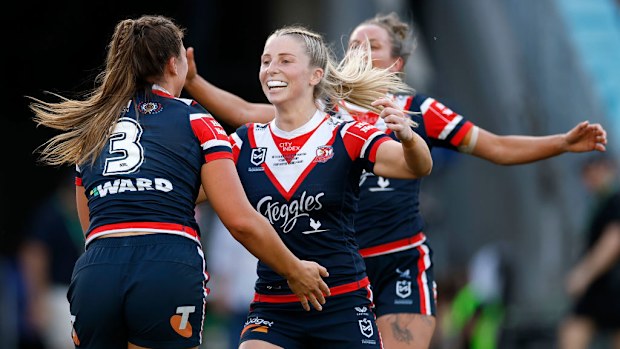 Tarryn Aiken celebrates with Jess Sergis.