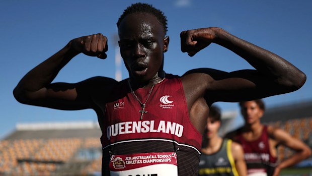 Gout Gout of Queensland celebrates winning the Boys' U18 200m Final in a new national time of 20.04 seconds.