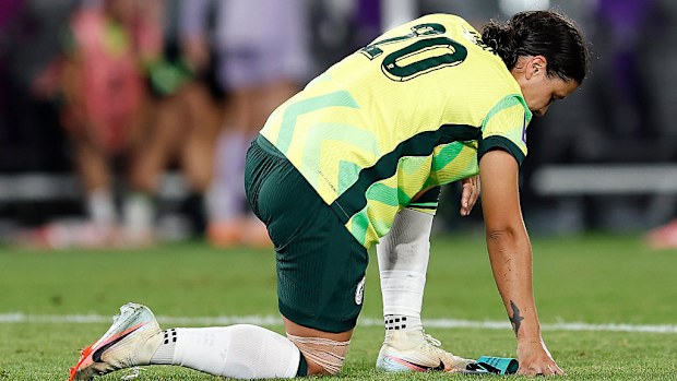 Sam Kerr of the Matildas looks dejected after losing.