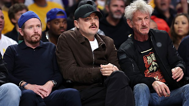 Actors Kevin Connolly, Leonardo DiCaprio and Sean Penn at Crypto.com Arena.