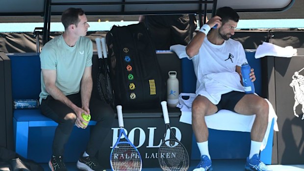 Novak Djokovic of Serbia with coach Andy Murray during a practice session.