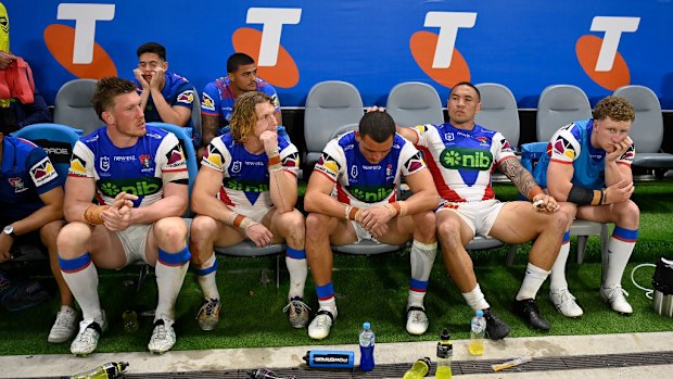 Knights players looks dejected on the bench.