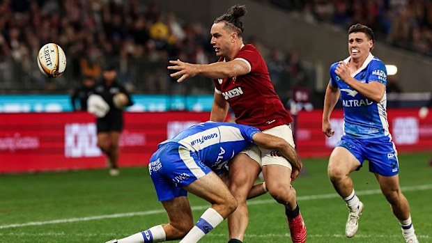 James Lowe of British & Irish Lions offloads on the way to setting up his side's fourth try.