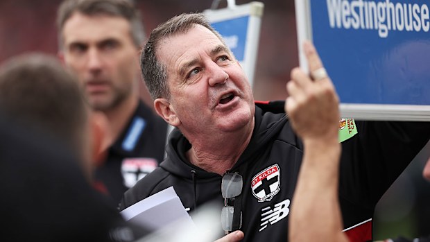 Saints head coach Ross Lyon speaks to his playing group.