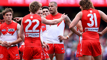 Swans forward Lance Franklin  speaks to his team mates.