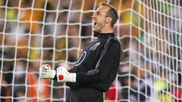 Mark Schwarzer of the Socceroos celebrates saving a goal during the penalty shootout the second leg of the 2006 FIFA World Cup qualifying match between Australia and Uruguay.