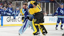 Boston Bruins goaltender Jeremy Swayman and Tampa Bay Lightning goaltender Andrei Vasilevskiy punch on during goalie fight.