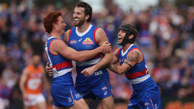 Marcus Bontempelli of the Bulldogs celebrates kicking a goal.